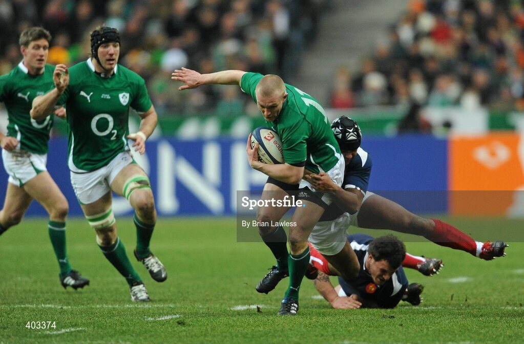 13 February 2010; Keith Earls, Ireland, is tackled by theirry Dusautoir, France. RBS Six Nations Rugby Championship, France v Ireland, Stade de France, Saint Denis, Paris, France. Picture credit: Brian Lawless / SPORTSFILE *** Local Caption ***