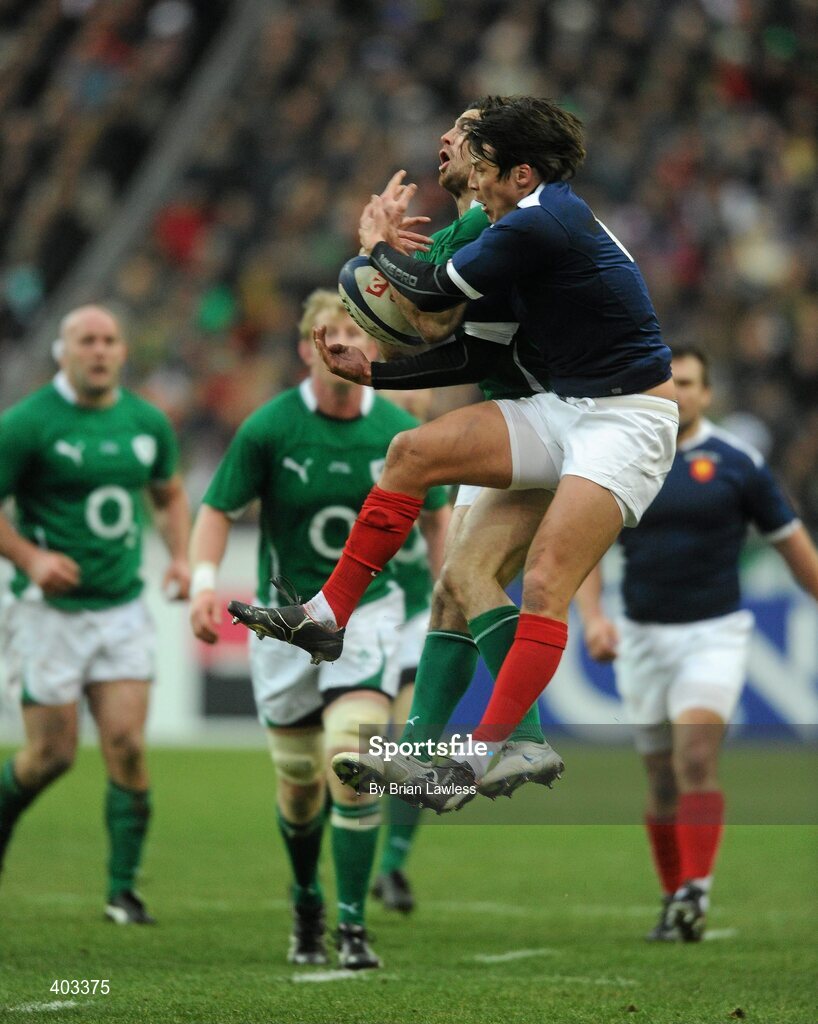 13 February 2010; Francois Trinh-Duc, France, is tackled by Rob Kearney, Ireland. RBS Six Nations Rugby Championship, France v Ireland, Stade de France, Saint Denis, Paris, France. Picture credit: Brian Lawless / SPORTSFILE *** Local Caption ***