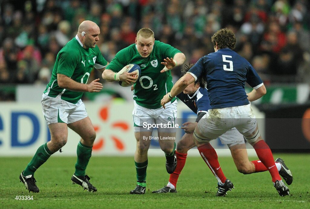 13 February 2010; Tom Court, supported by John Hayes, left, Ireland, is tackled by Morgan Parra and Pascal Pape, right, France. RBS Six Nations Rugby Championship, France v Ireland, Stade de France, Saint Denis, Paris, France. Picture credit: Brian Lawless / SPORTSFILE *** Local Caption ***
