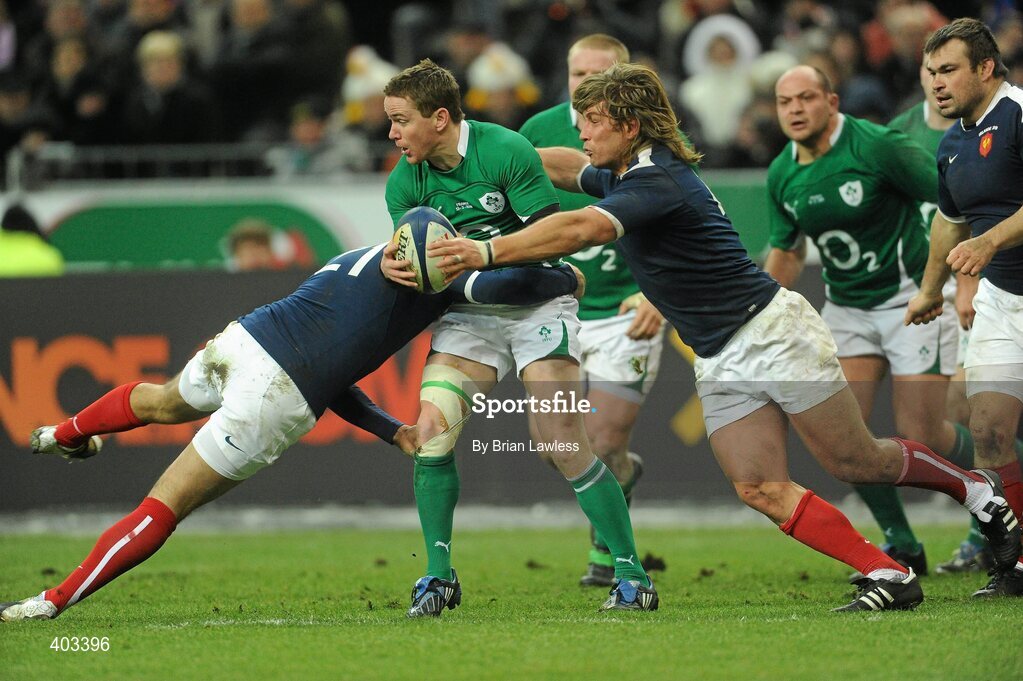 13 February 2010; Eoin Reddan, Ireland, is tackled by David Marty, left, and Dimitri Szarzewski, France. RBS Six Nations Rugby Championship, France v Ireland, Stade de France, Saint Denis, Paris, France. Picture credit: Brian Lawless / SPORTSFILE *** Local Caption ***