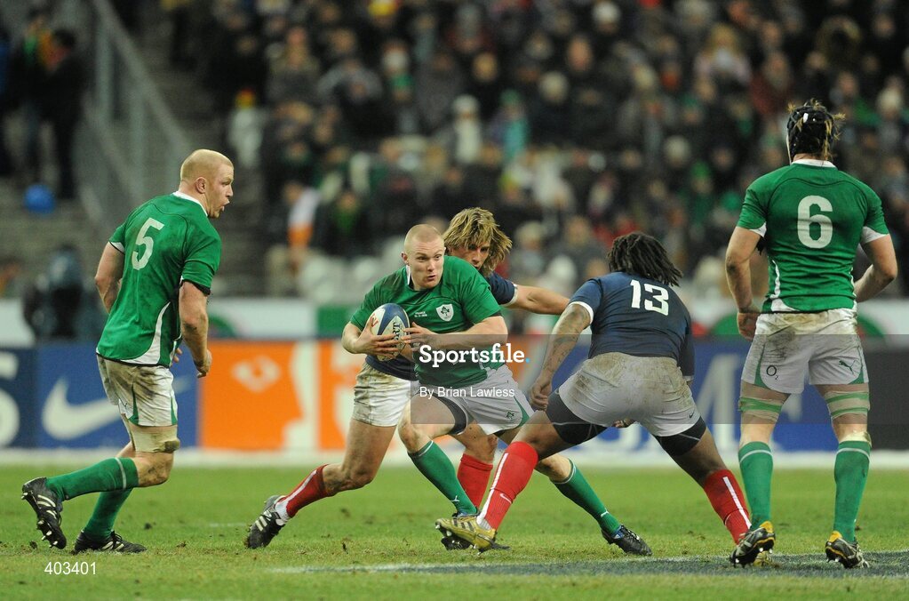 13 February 2010; Keith Earls, Ireland, is tackled by Dimitri Szarzewski and Mathieu Bastareaud, right, France. RBS Six Nations Rugby Championship, France v Ireland, Stade de France, Saint Denis, Paris, France. Picture credit: Brian Lawless / SPORTSFILE *** Local Caption ***