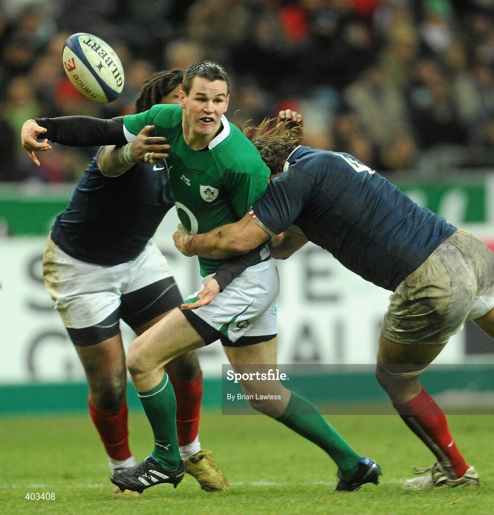 13 February 2010; Jonathan Sexton, Ireland, is tackled by Mathieu Bastareaud, left, and Lionel Nallet, France. RBS Six Nations Rugby Championship, France v Ireland, Stade de France, Saint Denis, Paris, France. Picture credit: Brian Lawless / SPORTSFILE *** Local Caption ***