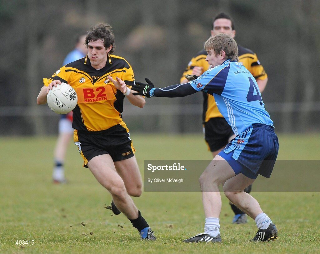 17 February 2010; Niall Coyne, NUI Maynooth, in action against Donal Morgan, UUJ. Ulster Bank Sigerson Cup Quarter-Final, University of Ulster Jordanstown v NUI Maynooth, Jordanstown, Shore Road, Newtownabbey, Co. Antrim. Picture credit: Oliver McVeigh / SPORTSFILE