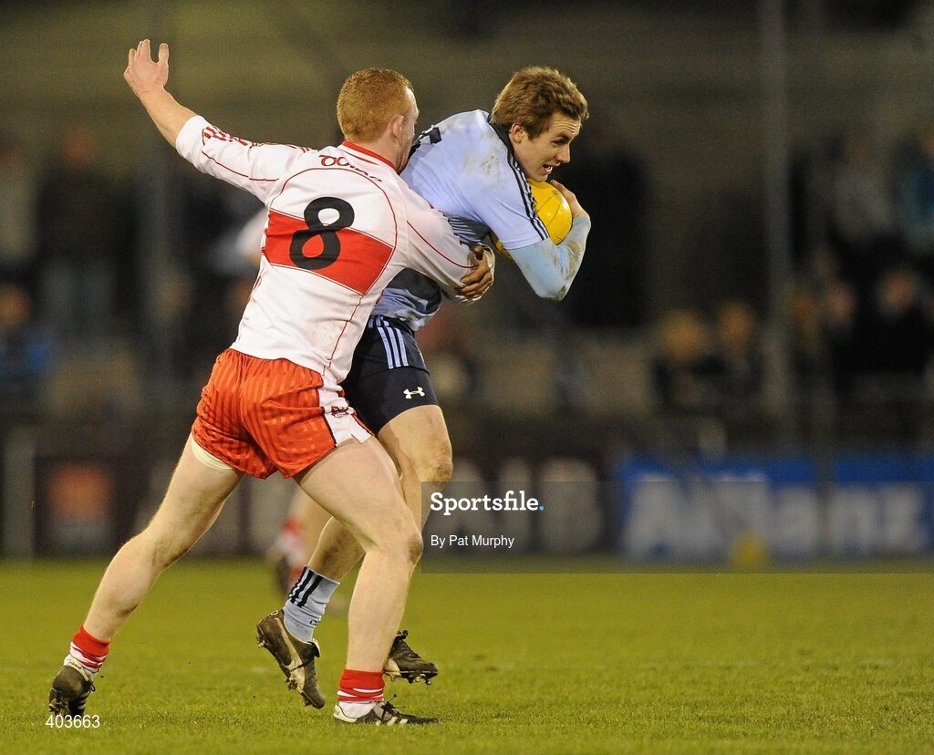 13 February 2010; Paul Griffin, Dublin, in action against Fergal Doherty, Derry. Allianz National Football League, Division 1, Round 2, Dublin v Derry, Parnell Park, Dublin. Picture credit: Pat Murphy / SPORTSFILE