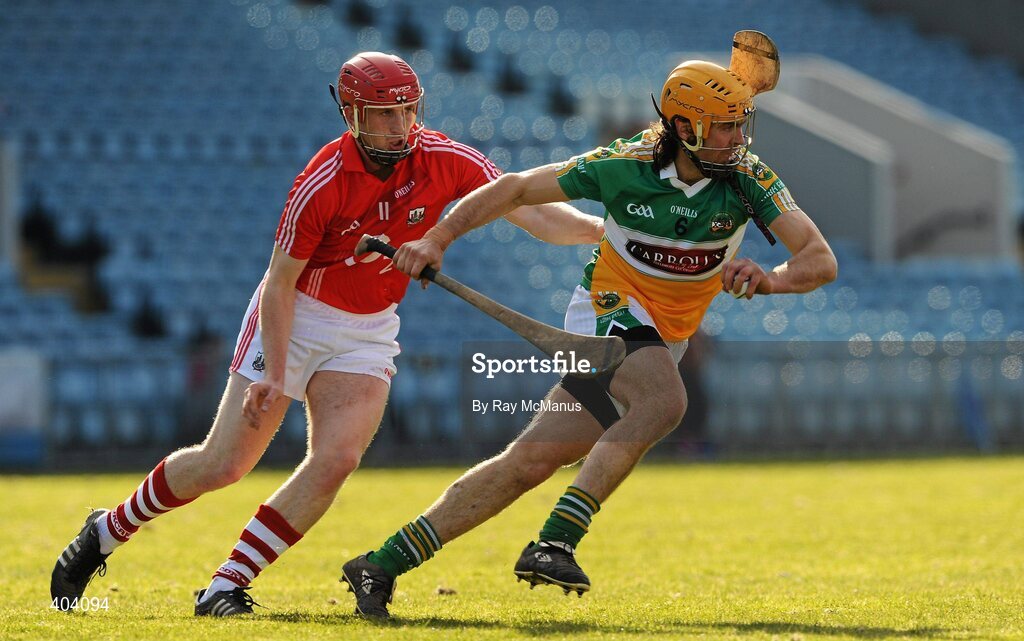 21 February 2010; Ger Oakley, Offaly, in action against Mark O'Sullivan, Cork. Allianz GAA Hurling National League Division 1 Round 1, Cork v Offaly. Pairc Ui Chaoimh, Cork. Picture credit: Ray McManus / SPORTSFILE