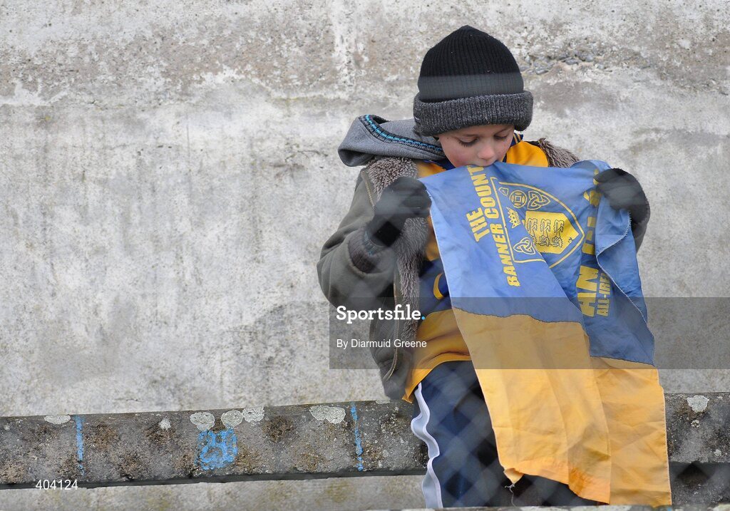 21 February 2010; A young Clare supporter prepares his flag before the game. Allianz GAA Hurling National League, Division 2 Round 1, Clare v Down. Cusack Park, Ennis, Co. Clare. Picture credit: Diarmuid Greene / SPORTSFILE