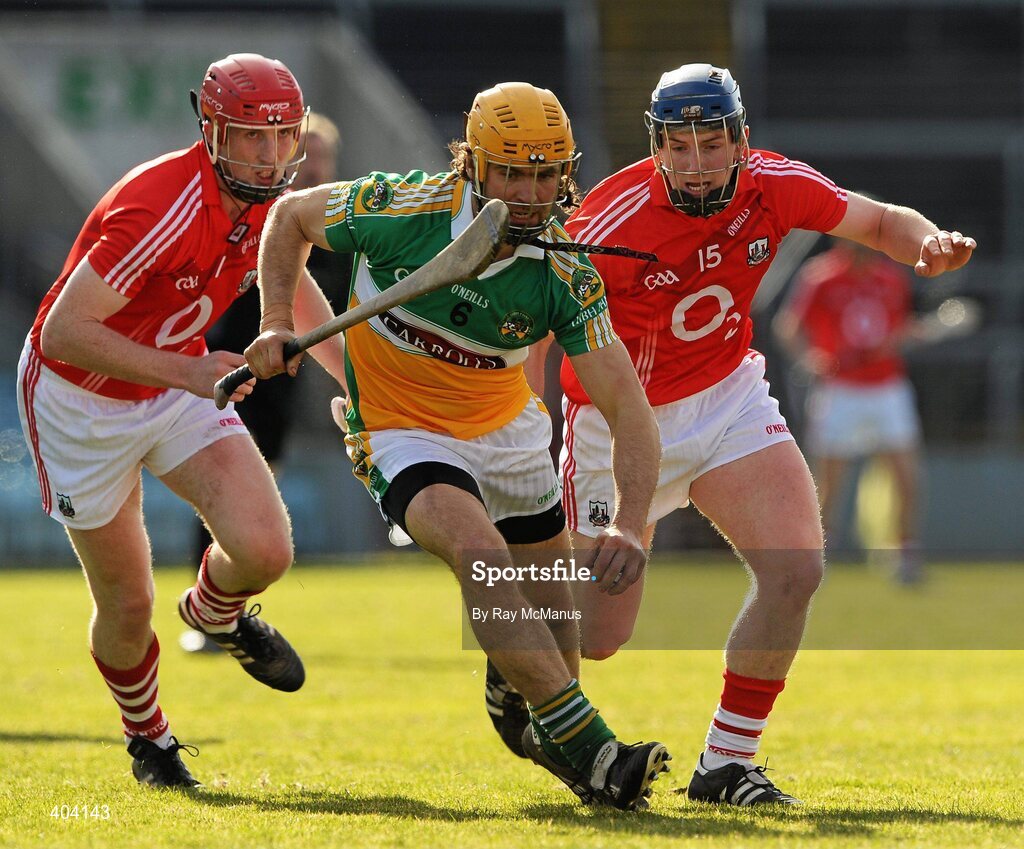 21 February 2010; Ger Oakley, Offaly, in action against Mark O'Sullivan, left, and Patrick Horgan, Cork. Allianz GAA Hurling National League Division 1 Round 1, Cork v Offaly. Pairc Ui Chaoimh, Cork. Picture credit: Ray McManus / SPORTSFILE