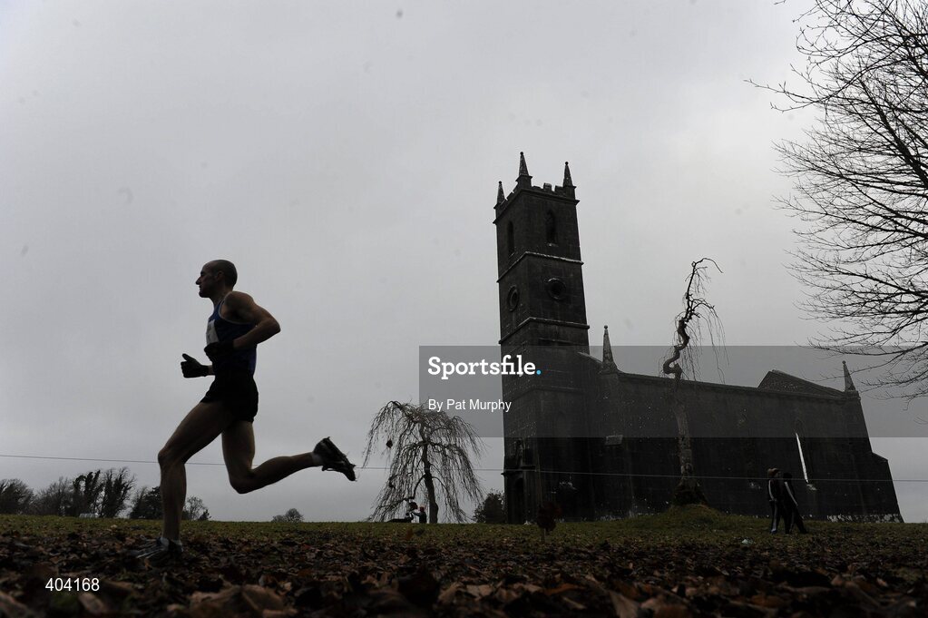 21 February 2010; An athlete makes his way past the church ruin during the Woodie’s DIY Masters Cross Country. Senior Athletes, Woodie’s DIY Masters Cross Country. Lough Key Forest Park, Boyle, Co. Roscommon. Picture credit: Pat Murphy / SPORTSFILE