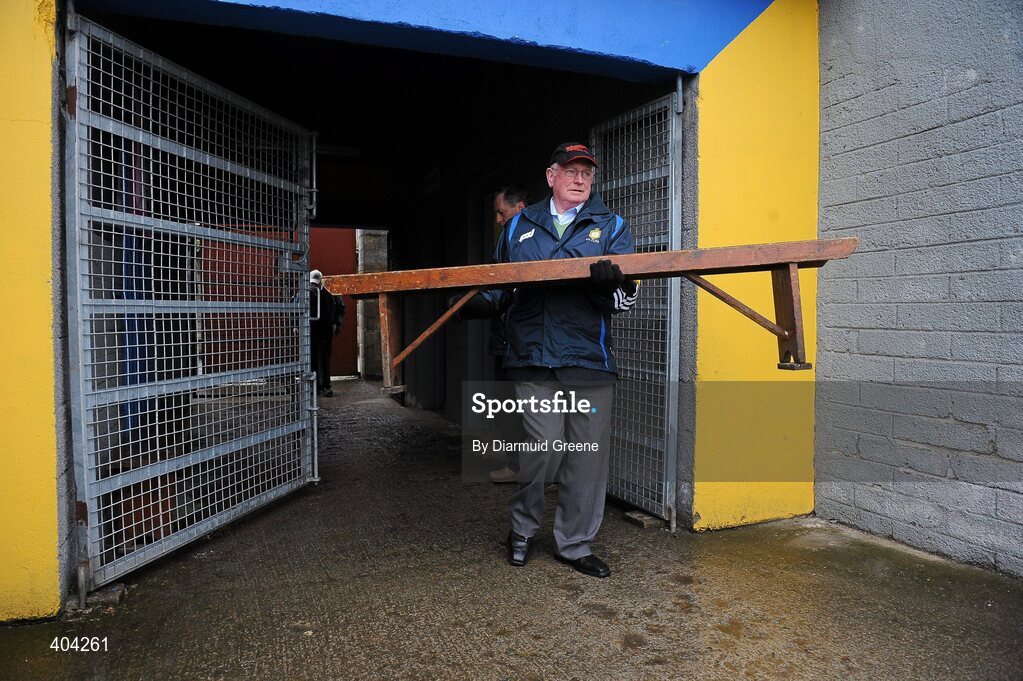 21 February 2010; PJ McMahon brings out the bench for the traditional team photographs before the game. Allianz GAA Hurling National League, Division 2 Round 1, Clare v Down. Cusack Park, Ennis, Co. Clare. Picture credit: Diarmuid Greene / SPORTSFILE