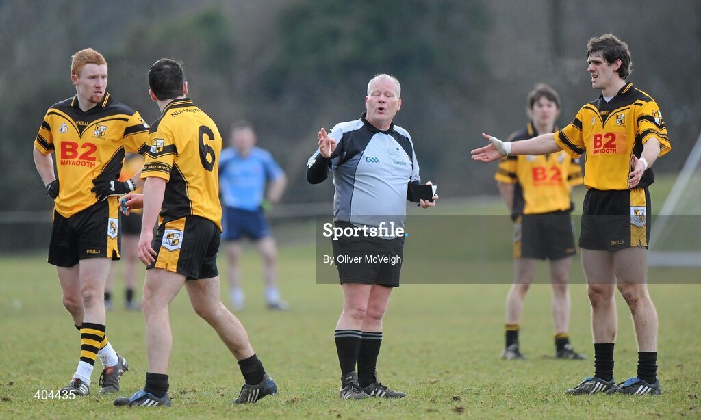 17 February 2010; Referee Padraig Mullen, sends off Ger Brennan, NUI Maynooth, 6, for a secoond yellow card. Ulster Bank Sigerson Cup Quarter-Final, University of Ulster Jordanstown v NUI Maynooth, Jordanstown, Shore Road, Newtownabbey, Co. Antrim. Picture credit: Oliver McVeigh / SPORTSFILE