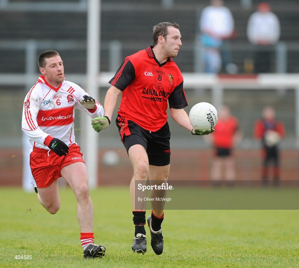 24 January 2010; Ambrose Rodgers, Down, in action against Barry McGuigan, Derry. Barrett Sports Lighting Dr. McKenna Cup, Group C, Derry v Down, Celtic Park, Derry. Picture credit: Oliver McVeigh / SPORTSFILE