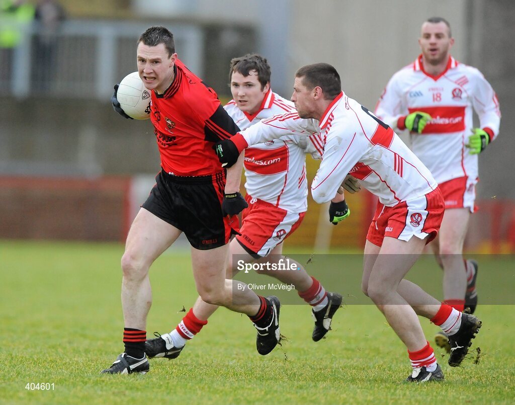 24 January 2010; John Clarke, Down, in action against Barry McGuigan, Derry. Barrett Sports Lighting Dr. McKenna Cup, Group C, Derry v Down, Celtic Park, Derry. Picture credit: Oliver McVeigh / SPORTSFILE
