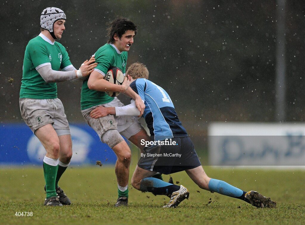 23 February 2010; Mark McPhillips, supported by team-mate Stephen Murphy, Gonzaga College SJ, is tackled by Eoin O'Connor, Newpark Comprehensive. Vinnie Murray Semi-Final, Newpark Comprehensive v Gonzaga College SJ, Old Belvedere RFC, Anglesea Road, Dublin. Picture credit: Stephen McCarthy / SPORTSFILE
