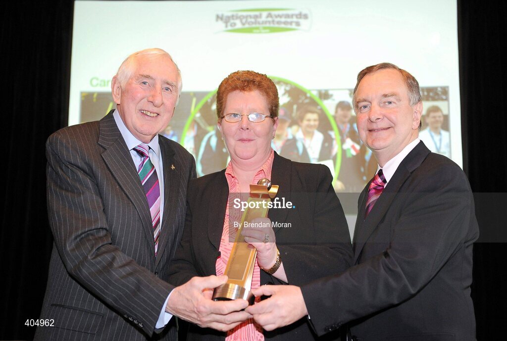 24 February 2010; Adult Coach of the Year Carmel Malone, from Irishtown, Co. Dublin, is presented with her award by Irish Olympian Dr. Ronnie Delany, left, and Martin Cullen, TD, Minister for Arts, Sport and Tourism, at the Volunteers in Irish Sports Awards 2009. Farmleigh, Castleknock, Dublin. Picture credit: Brendan Moran / SPORTSFILE