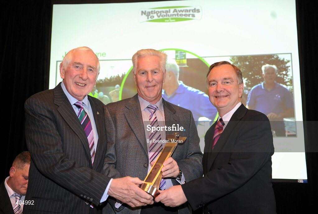 24 February 2010; Sports Official of the Year Joe Browne, from Howth, Co. Dublin, is presented with his award by Irish Olympian Dr. Ronnie Delany, left, and Martin Cullen, TD, Minister for Arts, Sport and Tourism, at the Volunteers in Irish Sports Awards 2009. Farmleigh, Castleknock, Dublin. Picture credit: Brendan Moran / SPORTSFILE