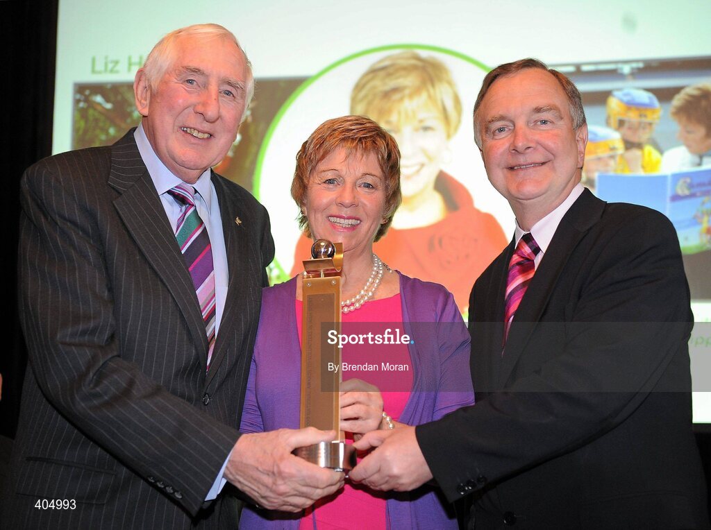 24 February 2010; National Administrator of the Year Liz Howard, from Tipperary, is presented with her award by Irish Olympian Dr. Ronnie Delany, left, and Martin Cullen, TD, Minister for Arts, Sport and Tourism, at the Volunteers in Irish Sports Awards 2009. Farmleigh, Castleknock, Dublin. Picture credit: Brendan Moran / SPORTSFILE