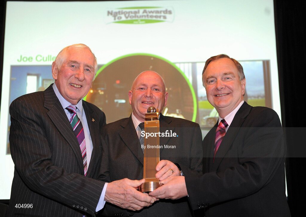 24 February 2010; Clubman of the Year Joe Cullen, from Kilbarrack, Co. Dublin, is presented with his award by Irish Olympian Dr. Ronnie Delany, left, and Martin Cullen, TD, Minister for Arts, Sport and Tourism, at the Volunteers in Irish Sports Awards 2009. Farmleigh, Castleknock, Dublin. Picture credit: Brendan Moran / SPORTSFILE