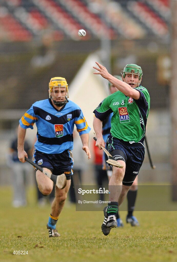 25 February 2010; Sean Collins, LIT, gets his hand pass away despite the attentions of Peter Atkinson, UCD. Ulster Bank Fitzgibbon Cup Quarter-Final, Limerick Institute of Technology v University College Dublin, University of Limerick, Limerick. Picture credit: Diarmuid Greene / SPORTSFILE
