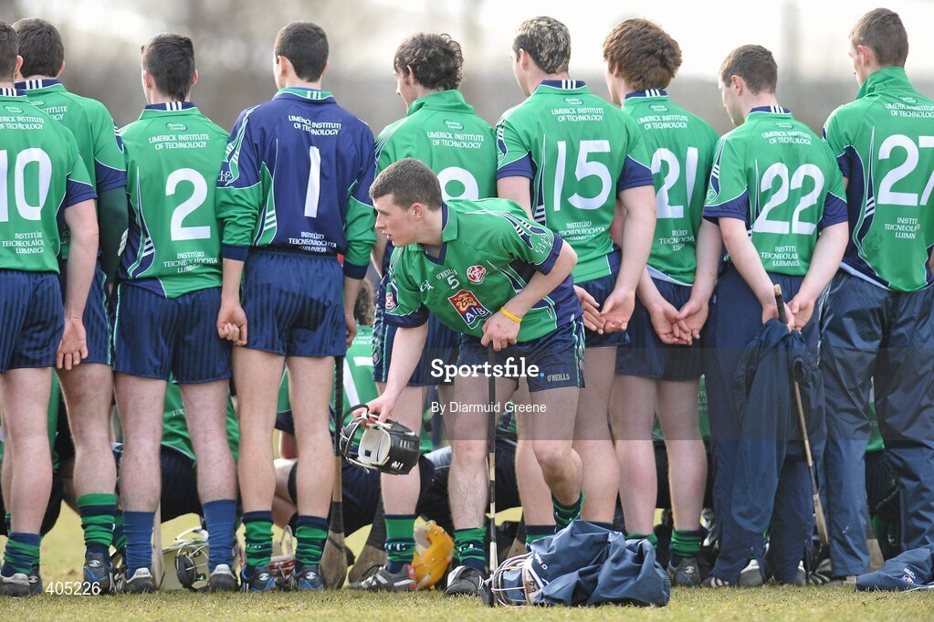 25 February 2010; Nicky O'Connell, LIT, leaves the team photo early to gather his helmet before the game. Ulster Bank Fitzgibbon Cup Quarter-Final, Limerick Institute of Technology v University College Dublin, University of Limerick, Limerick. Picture credit: Diarmuid Greene / SPORTSFILE