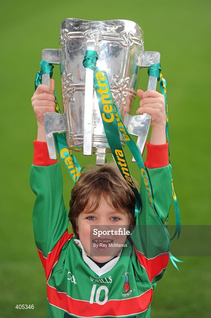 26 February 2010; Seven-year-old GAA Star of the future Charlie McHugh, from the Naomh Barróg GAA Club, Kilbarrack, Dublin, with the Liam MacCarthy Cup at the announcement of a new partnership with Centra and its 558 retail partners. Centra have been confirmed as an official sponsor of the GAA Hurling All-Ireland Championship. Croke Park, Dublin. Picture credit: Ray McManus / SPORTSFILE