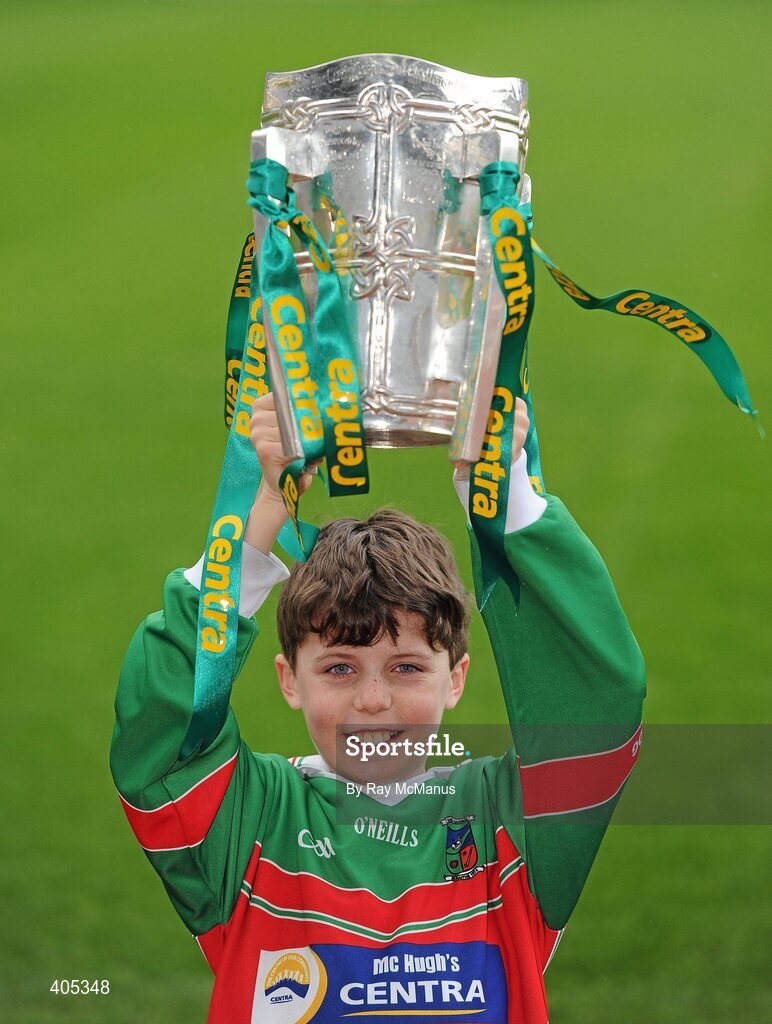 26 February 2010; GAA Stars of the future Cillian Costello, eleven years, from the Naomh Barróg GAA Club, Kilbarrack, Dublin, with the Liam MacCarthy Cup at the announcement of a new partnership with Centra and its 558 retail partners. Centra have been confirmed as an official sponsor of the GAA Hurling All-Ireland Championship. Croke Park, Dublin. Picture credit: Ray McManus / SPORTSFILE