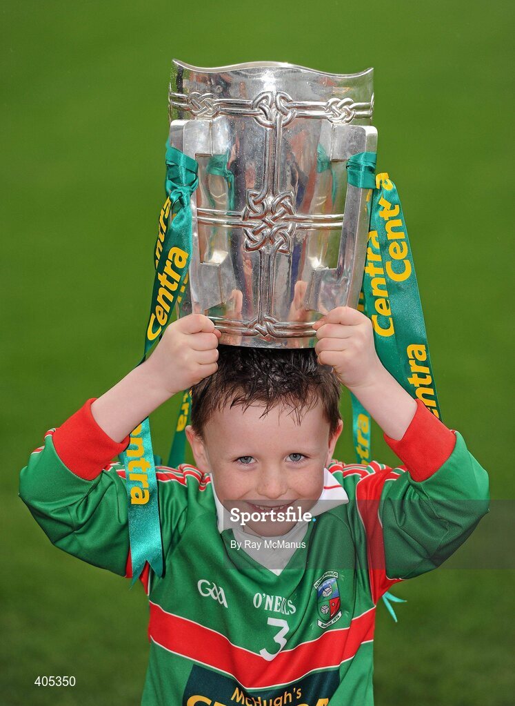 26 February 2010; Seven year old GAA Star of the future Sean Byrne, from the Naomh Barróg GAA Club, Kilbarrack, Dublin, with the Liam MacCarthy Cup at the announcement of a new partnership with Centra and its 558 retail partners. Centra have been confirmed as an official sponsor of the GAA Hurling All-Ireland Championship. Croke Park, Dublin. Picture credit: Ray McManus / SPORTSFILE