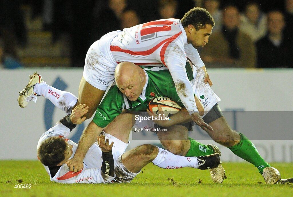 26 February 2010; Gary Halpin, Ireland Legends, is tackled by Dan Lugher and Jason Robinson, 11, England Legends. The Stuart Mangan Memorial Cup, England Legends v Ireland Legends, The Stoop, Twickenham, London. Picture credit: Brendan Moran / SPORTSFILE