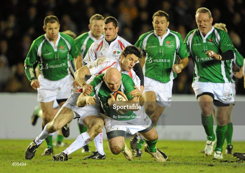 26 February 2010; Gary Halpin, Ireland Legends, is tackled by Martin Corry, England Legends. The Stuart Mangan Memorial Cup, England Legends v Ireland Legends, The Stoop, Twickenham, London. Picture credit: Brendan Moran / SPORTSFILE