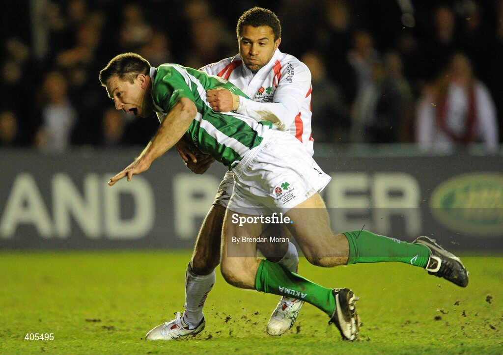 26 February 2010; Justin Bishop, Ireland Legends, is tackled by Jason Robinson, England Legends, on his way to scoring his side's second try. The Stuart Mangan Memorial Cup, England Legends v Ireland Legends, The Stoop, Twickenham, London. Picture credit: Brendan Moran / SPORTSFILE