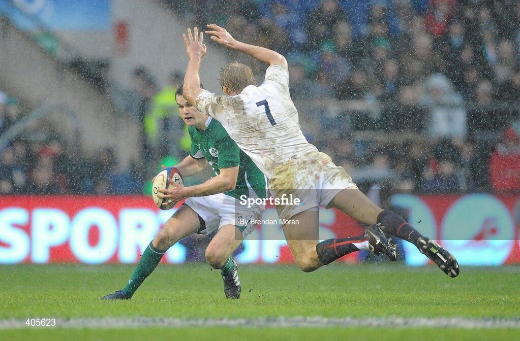 27 February 2010; Jonathan Sexton, Ireland, sells a dummy to Lewis Moody, England. RBS Six Nations Rugby Championship, England v Ireland, Twickenham Stadium, Twickenham, London, England. Picture credit: Brendan Moran / SPORTSFILE
