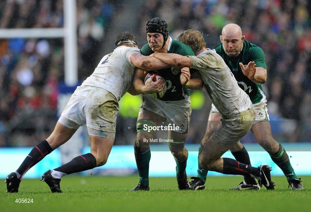 27 February 2010; Stephen Ferris, Ireland, is tackled by Dylan Hartley, left, and Lewis Moody, England. RBS Six Nations Rugby Championship, England v Ireland, Twickenham Stadium, Twickenham, London, England. Picture credit: Matt Browne / SPORTSFILE