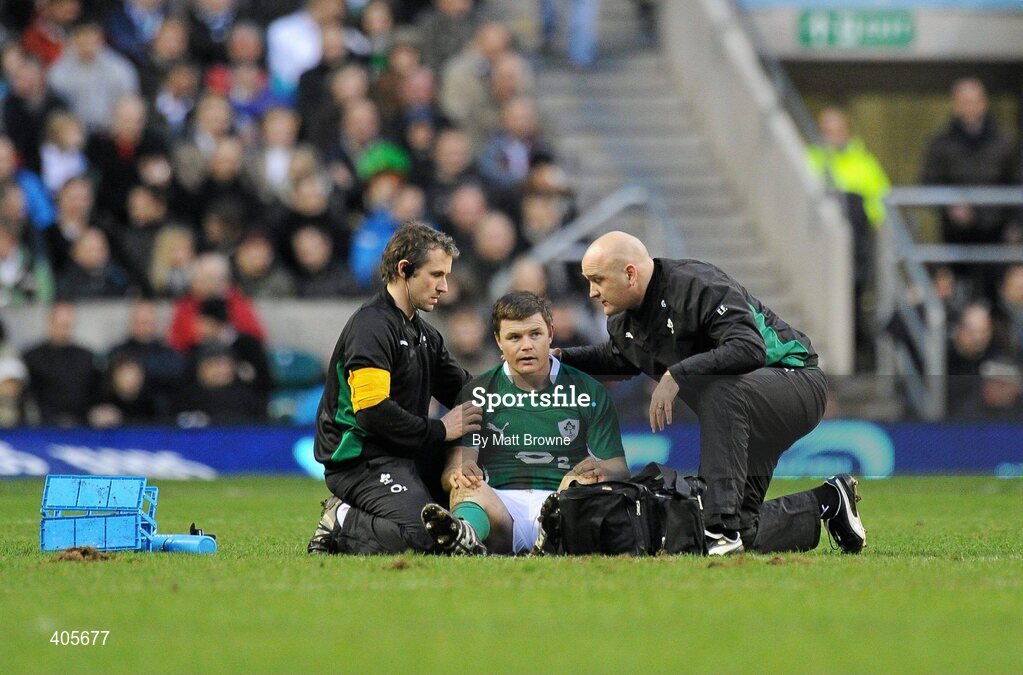 27 February 2010; Brian O'Driscoll, Ireland, receives attention from physio Cameron Steele, left, and team doctor Eanna Falvey during the game. RBS Six Nations Rugby Championship, England v Ireland, Twickenham Stadium, Twickenham, London, England. Picture credit: Matt Browne / SPORTSFILE