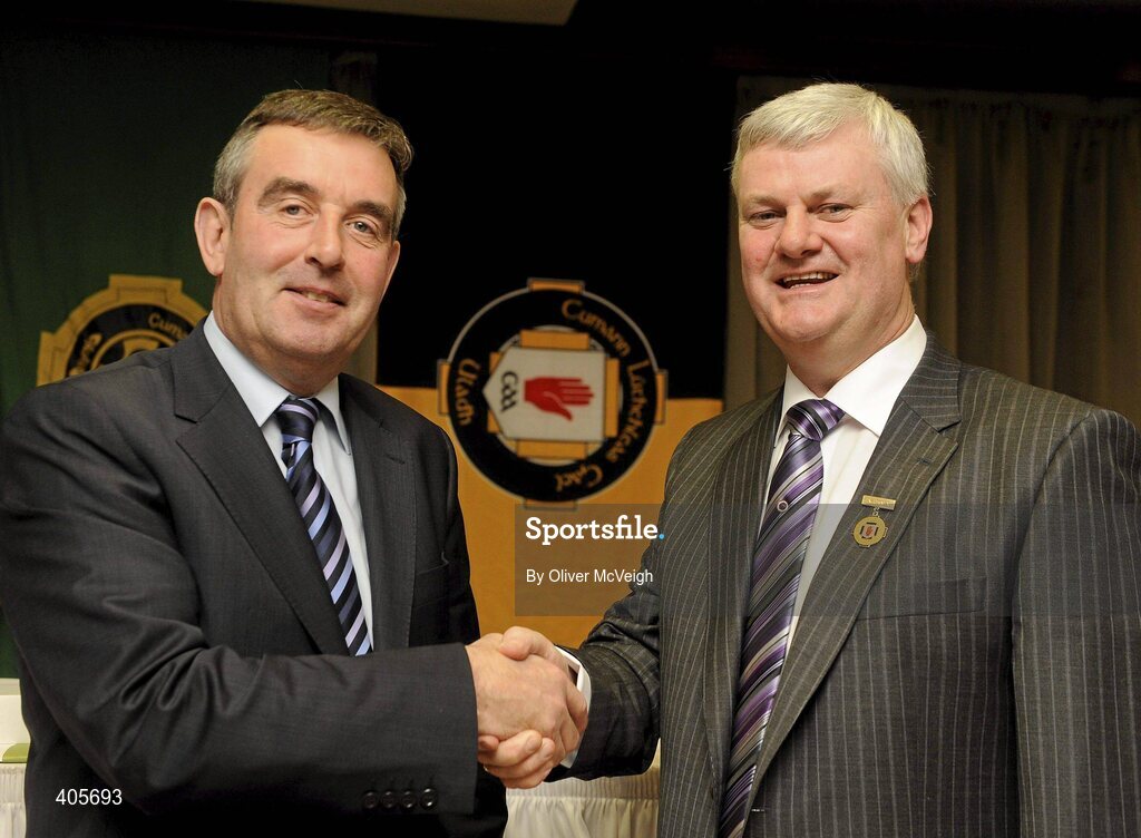 27 February 2010; Outgoing Ulster GAA President Tom Daly, left, hands over the Ulster "O'Neill" Presidential medal to new President Aogan Farrell at the Ulster Council GAA convention. Ulster Council GAA Convention, Errigal Hotel, Cootehill, Co. Cavan. Picture credit: Oliver McVeigh / SPORTSFILE