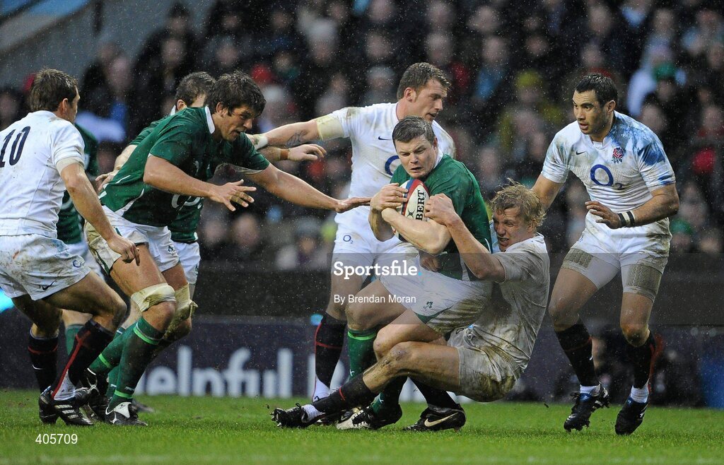 27 February 2010; Brian O'Driscoll, Ireland, is tackled by Lewis Moody, England. RBS Six Nations Rugby Championship, England v Ireland, Twickenham Stadium, Twickenham, London, England. Picture credit: Brendan Moran / SPORTSFILE