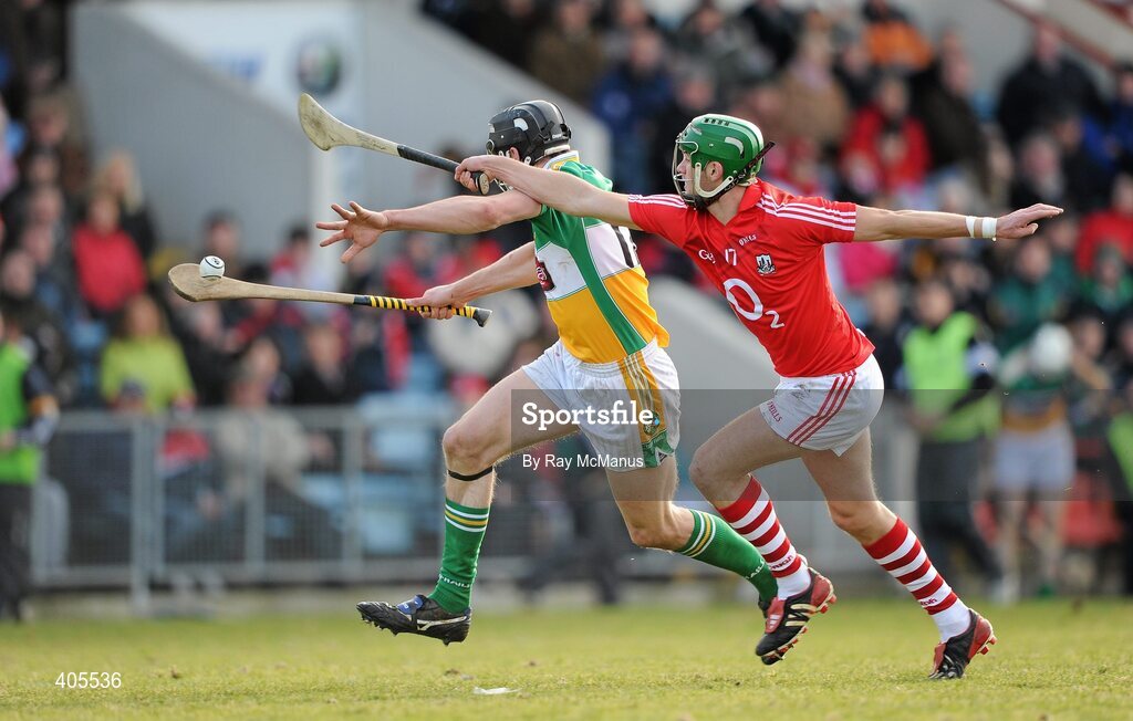 21 February 2010; Conor Mahon, Offaly, is tackled by Eoin Cadogan, Cork. Allianz GAA Hurling National League Division 1 Round 1, Cork v Offaly. Pairc Ui Chaoimh, Cork. Picture credit: Ray McManus / SPORTSFILE