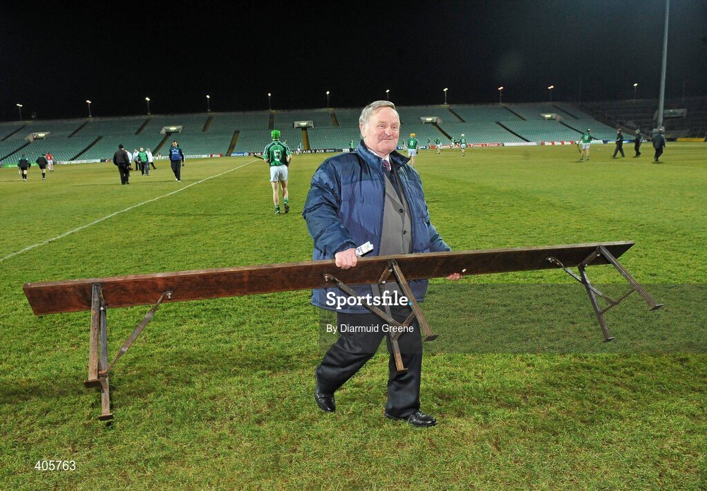 27 February 2010; Chief match steward John Naughton returns the team bench after the traditional team photographs. 1 Round 2, Limerick v Cork, Gaelic Grounds, Limerick. Picture credit: Diarmuid Greene / SPORTSFILE