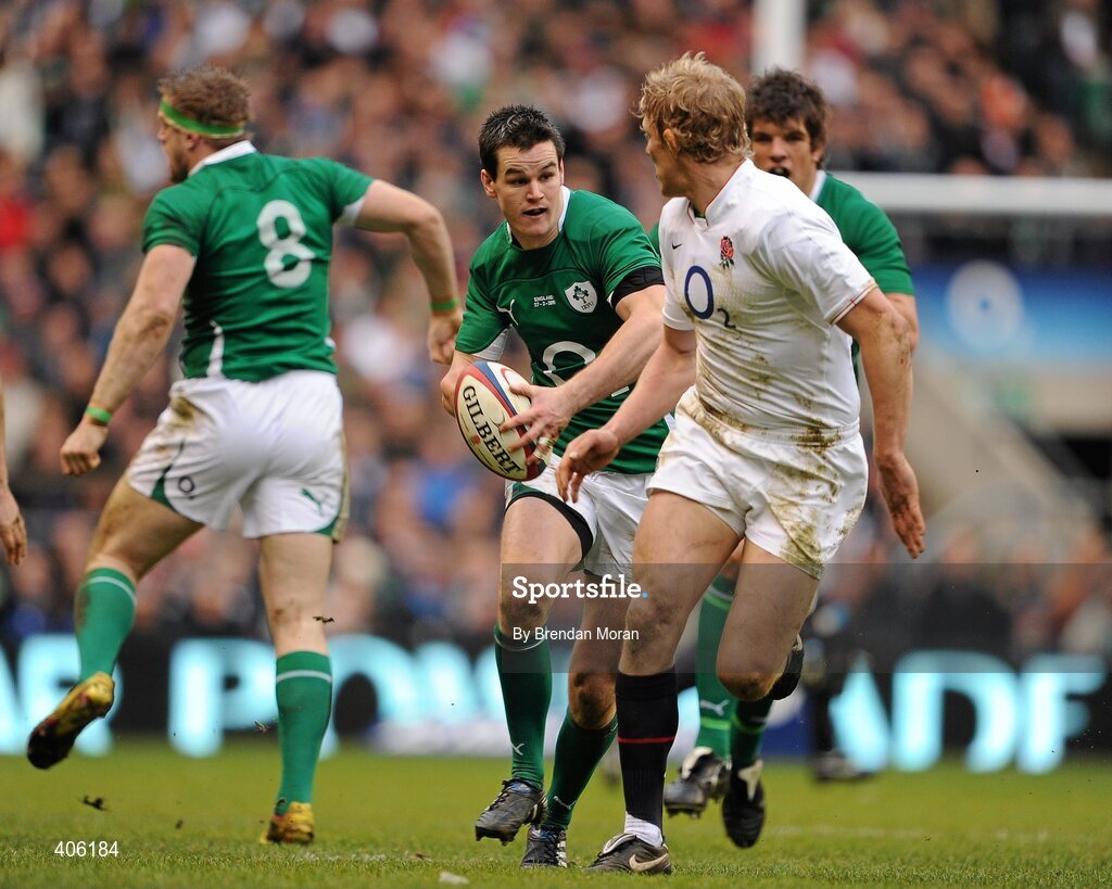 27 February 2010; Jonathan Sexton, Ireland, throws a dummy to England's Lewis Moody on his way to setting up Ireland's first try scored by Tommy Bowe. RBS Six Nations Rugby Championship, England v Ireland, Twickenham Stadium, Twickenham, London, England. Picture credit: Brendan Moran / SPORTSFILE