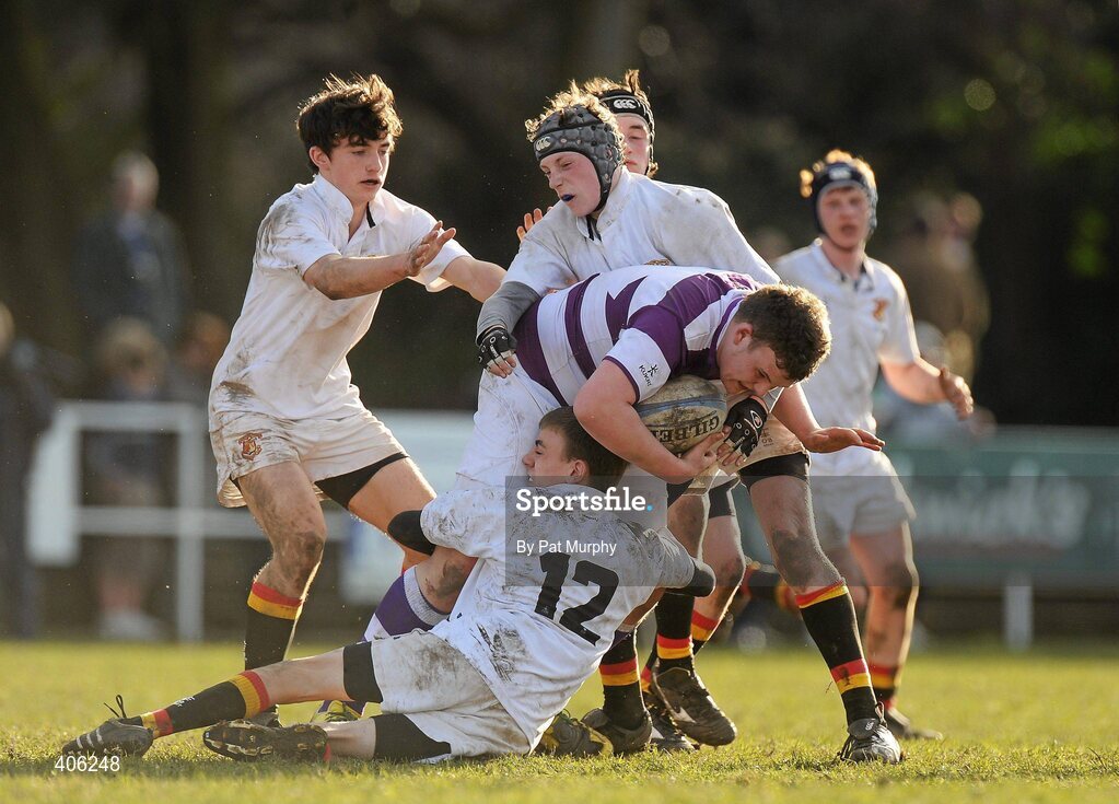 1 March 2010; Craig Roche-McMenamin, Clongowes Wood College, in action against, from left, Oisin Moran, Jason Curran, 12, and Cormac Gleeson Presentation College Bray. Leinster Schools Junior Cup Quarter-Final, Presentation College Bray v Clongowes Wood College SJ. Lakelands Park, Terenure, Dublin. Picture credit: Pat Murphy / SPORTSFILE