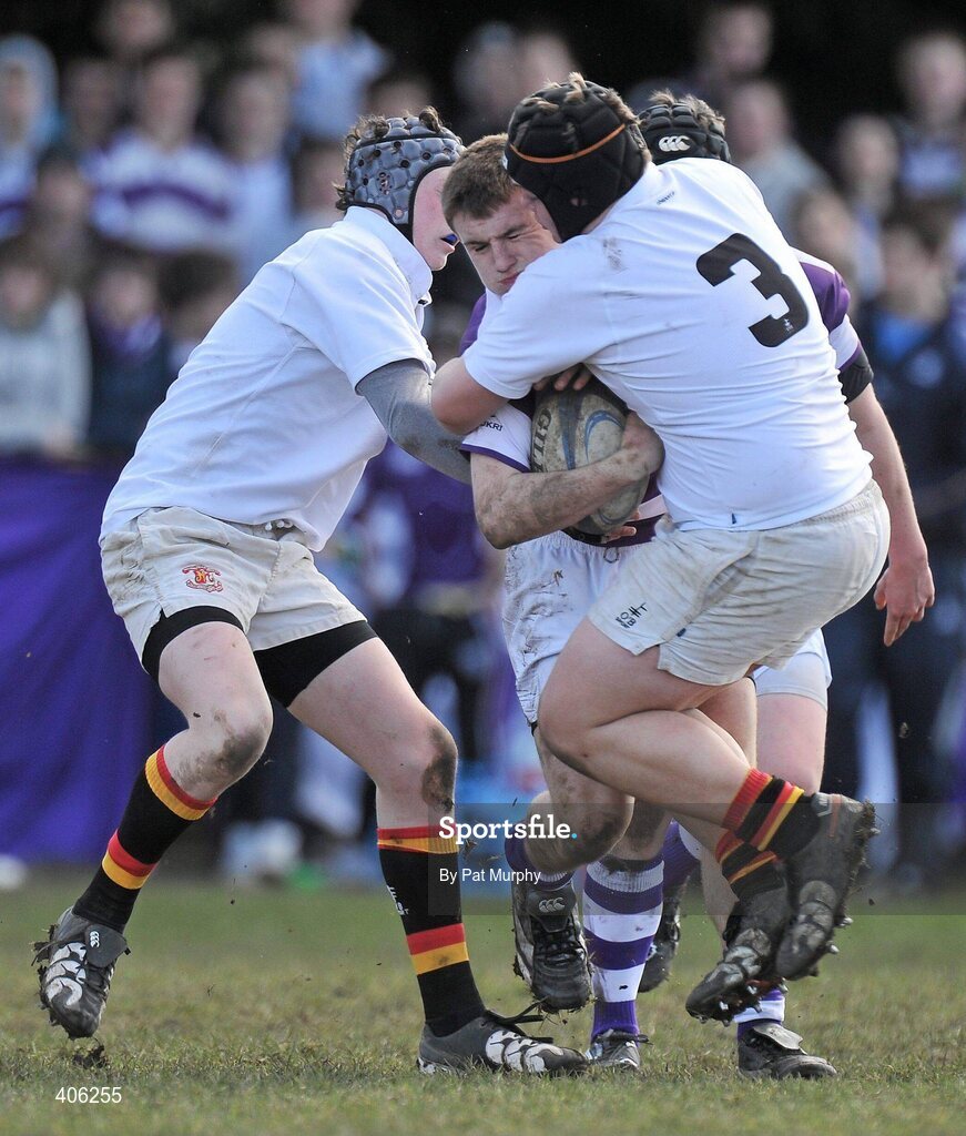 1 March 2010; Dylan Donnellan, Clongowes Wood College, in action against Cormac Gleeson, left, and Conor Pearse, Presentation College Bray. Leinster Schools Junior Cup Quarter-Final, Presentation College Bray v Clongowes Wood College SJ. Lakelands Park, Terenure, Dublin. Picture credit: Pat Murphy / SPORTSFILE