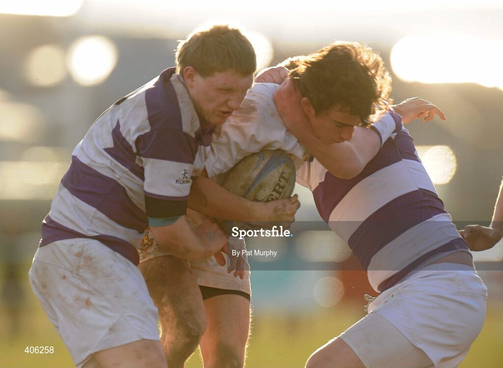 1 March 2010; Oisin Moran, Presentation College Bray, in action against David Garty, left, and Cormac Gillick, Clongowes Wood College. Leinster Schools Junior Cup Quarter-Final, Presentation College Bray v Clongowes Wood College SJ. Lakelands Park, Terenure, Dublin. Picture credit: Pat Murphy / SPORTSFILE