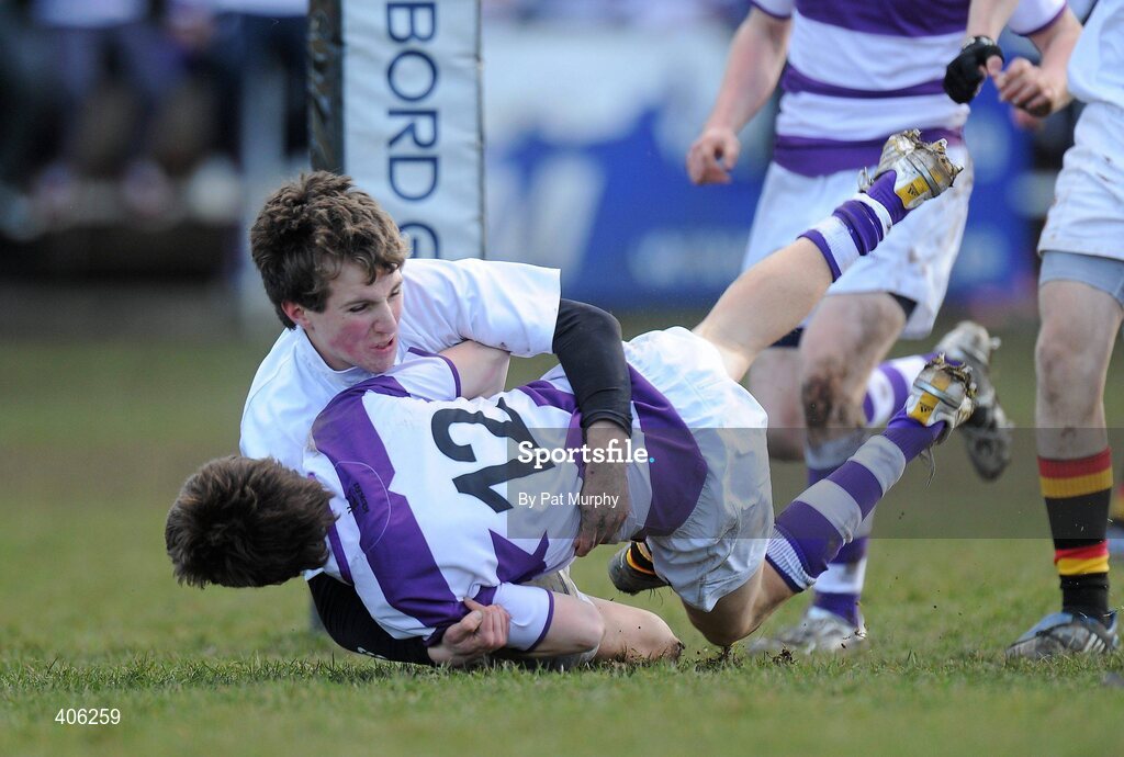 1 March 2010; Daniel O'Sullivan, Clongowes Wood College, scores his side's first try despite the challenge of Diarmuid Cassidy, Presentation College Bray. Leinster Schools Junior Cup Quarter-Final, Presentation College Bray v Clongowes Wood College SJ. Lakelands Park, Terenure, Dublin. Picture credit: Pat Murphy / SPORTSFILE