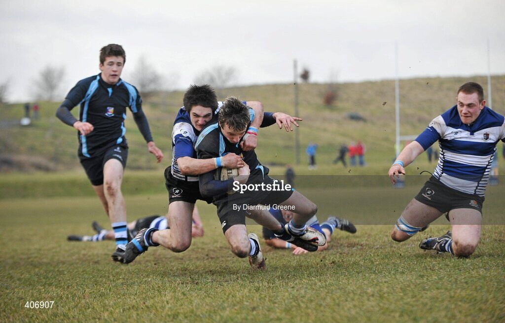3 March 2010; Padraig Quinn, Castletroy, goes over to score his side's first try late in the game despite the tackle from Tim Rafferty, Rockwell. Avonmore Munster Rugby Schools Senior Cup Semi-Final, Rockwell v Castletroy College, Clanwilliam Park, Tipperary Town, Tipperary. Picture credit: Diarmuid Greene / SPORTSFILE