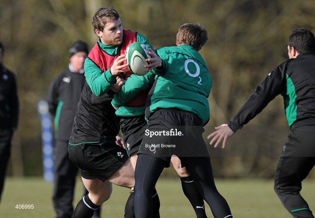 4 March 2010; Ireland's Gordon D'Arcy is tackled by Johne Murphy and Cian Healy while passing the ball to Rob Kearney during rugby squad training ahead of their RBS Six Nations Rugby Championship game against Wales on Saturday week. Carton House, Maynooth, Co. Kildare. Picture credit: Matt Browne / SPORTSFILE