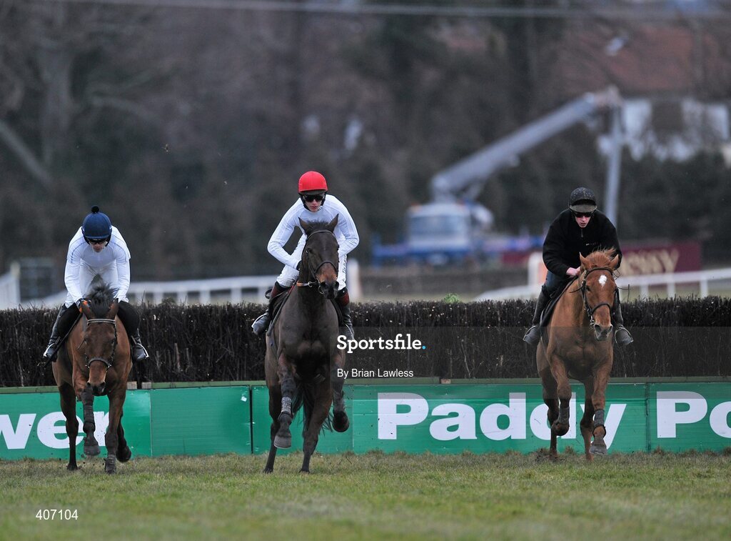 28 February 2010; Willie Mullins trained horses, from left, Uimhiraceathair, with Ruby Walsh up, Cooldine, Paul Townend up, and Midnight Club, Emmet Mullins up, during the gallops after the days racing. Leopardstown Racecourse, Dublin. Picture credit: Brian Lawless / SPORTSFILE