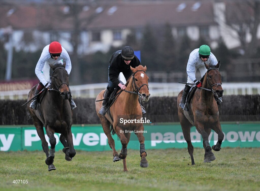 28 February 2010; Willie Mullins trained horses, from left, Cooldine, with Paul Townend up, Midnight Club, Emmet Mullins up, and Ballytrim, David Casey up, during the gallops after the days racing. Leopardstown Racecourse, Dublin. Picture credit: Brian Lawless / SPORTSFILE