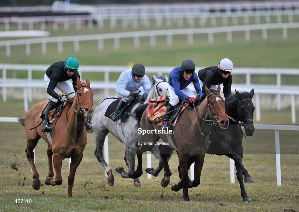 28 February 2010; Dessie Hughes trained horses, Schindlers Hunt, with Roger Loughran up, Lenabane, Paddy Flood up, second from right, and, Rare Bob, Brian Cooper up, right, during the gallops after the days racing. Leopardstown Racecourse, Dublin. Picture credit: Brian Lawless / SPORTSFILE