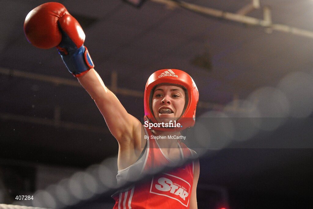 5 March 2010; Jennifer Harte, Four Corners, celebrates her 48kg women's novice final victory over Catherine O'Grady, Clann Naofa, after the referee stopped the contest in the thrid and final round. National Men's & Women's Elite National Championships 2010 Finals - Friday, National Stadium, Dublin. Picture credit: Stephen McCarthy / SPORTSFILE