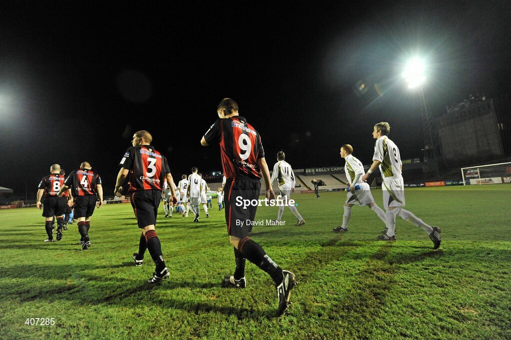 5 March 2010; Players from both Bohemians and Sporting Fingal walk out for the start of the first game of the new season. Airtricity League, Premier Division, Bohemians v Sporting Fingal, Dalymount Park, Dublin. Picture credit: David Maher / SPORTSFILE