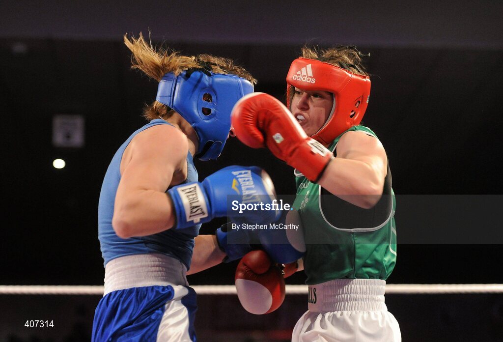 5 March 2010; Katie Taylor, Bray, Ireland, exchanges punches with Julia Tsyplakova, Ukraine, during their womens 60kg special bout. National Men's & Women's Elite National Championships 2010 Finals - Friday, National Stadium, Dublin. Picture credit: Stephen McCarthy / SPORTSFILE