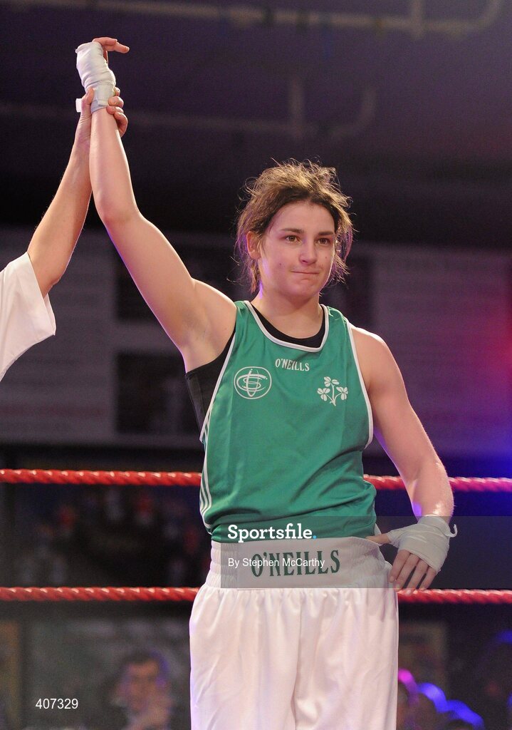 5 March 2010; Katie Taylor, Bray, Ireland, is announced victorious over Julia Tsyplakova, Ukraine, following their womens 60kg special bout. National Men's & Women's Elite National Championships 2010 Finals - Friday, National Stadium, Dublin. Picture credit: Stephen McCarthy / SPORTSFILE